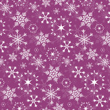 Seamless vector pattern - white snowflakes on pink background