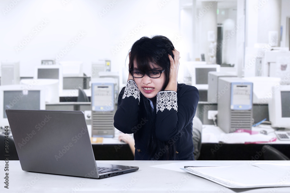 Stress Businesswoman in an office Stress Businesswoman in an office