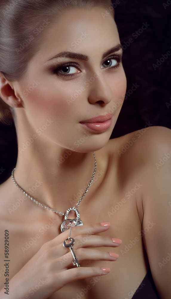 woman with makeup with jewelry precious decorations.