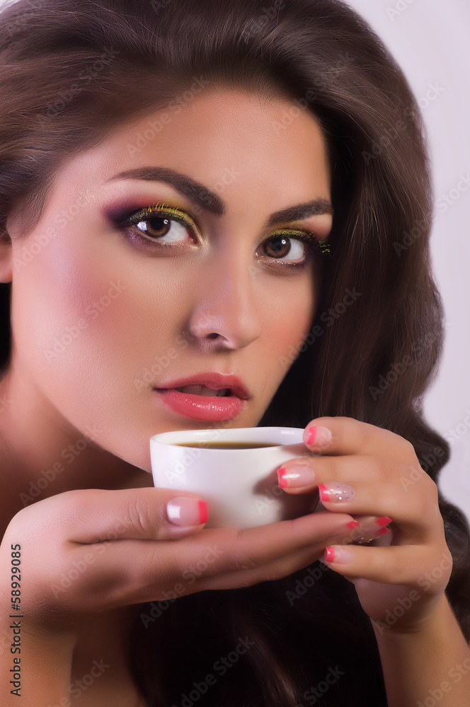 Beautiful woman with coffee cup. Fashion portrait Beautiful woman with coffee cup. Fashion portrait