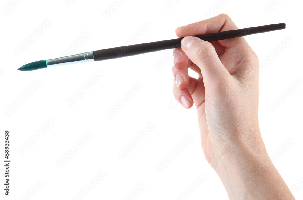 Hand holding brush with green paint isolated on white Hand holding brush with green paint isolated on white