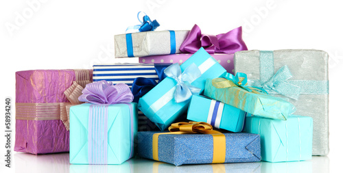 Pile of colorful gifts boxes isolated on white © Africa Studio