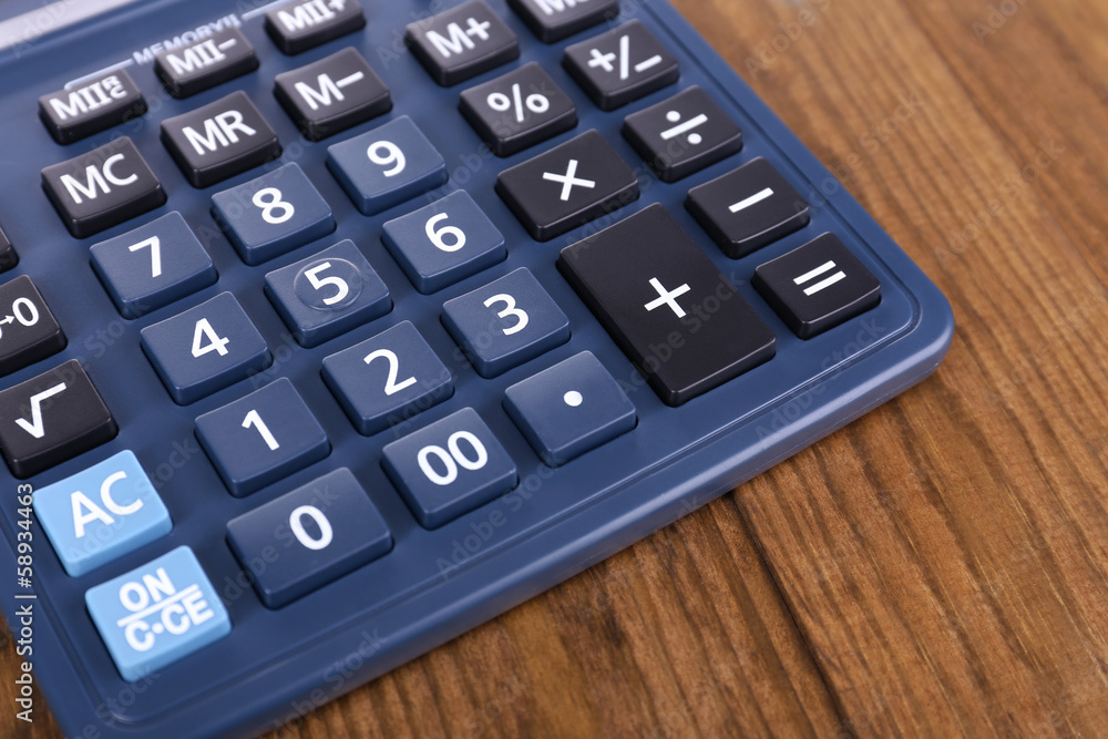 Digital calculator on table close-up Digital calculator on table close-up