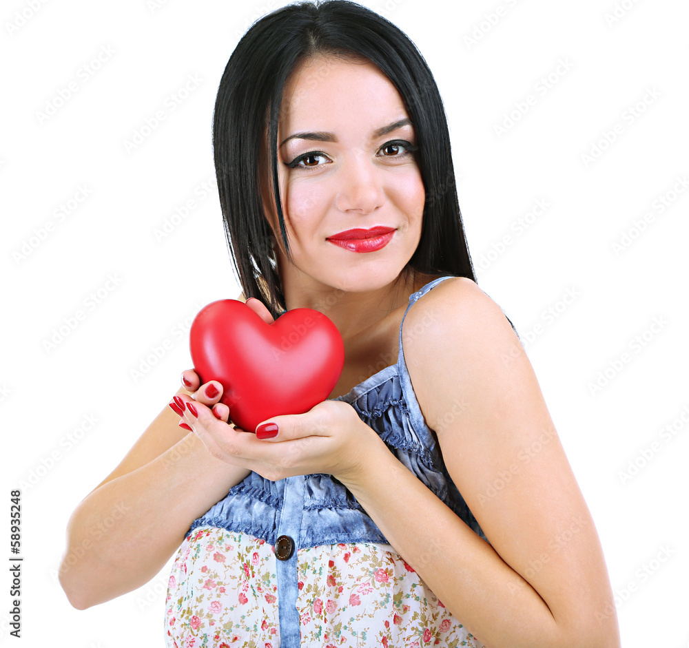 Attractive young woman with heart isolated on white Attractive young woman with heart isolated on white
