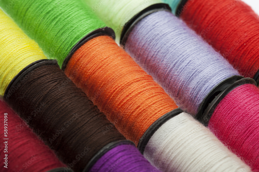 Background made of colorful sewing threads Background made of colorful sewing threads