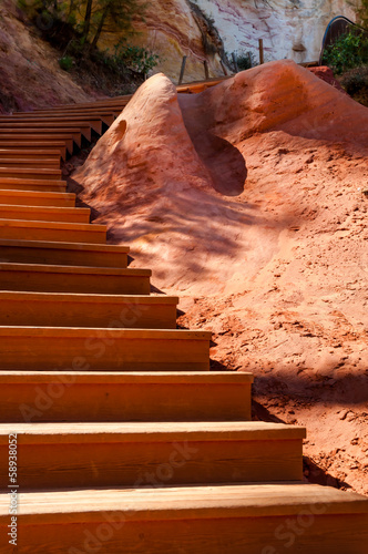 Close up of wooden stairs on Le Sentier des Ocres in Roussillon photo