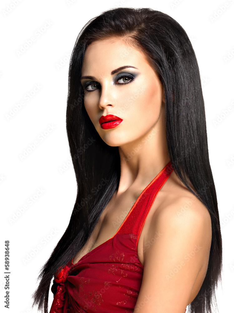 Portrait of the beautiful woman with black hairs and red lips Portrait of the beautiful woman with black hairs and red lips