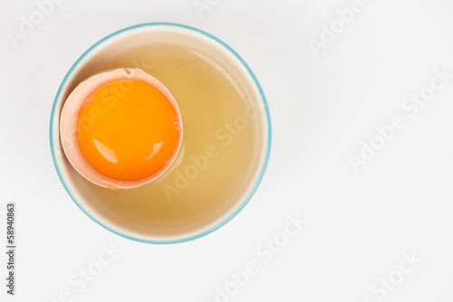 Separation the yolk of egg in little bowl