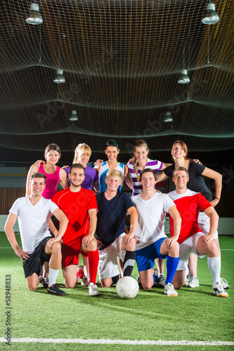 Team playing football or soccer sport indoor