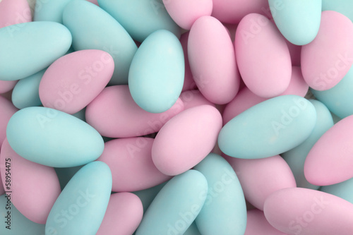 background of pink and blue sugared almonds photo