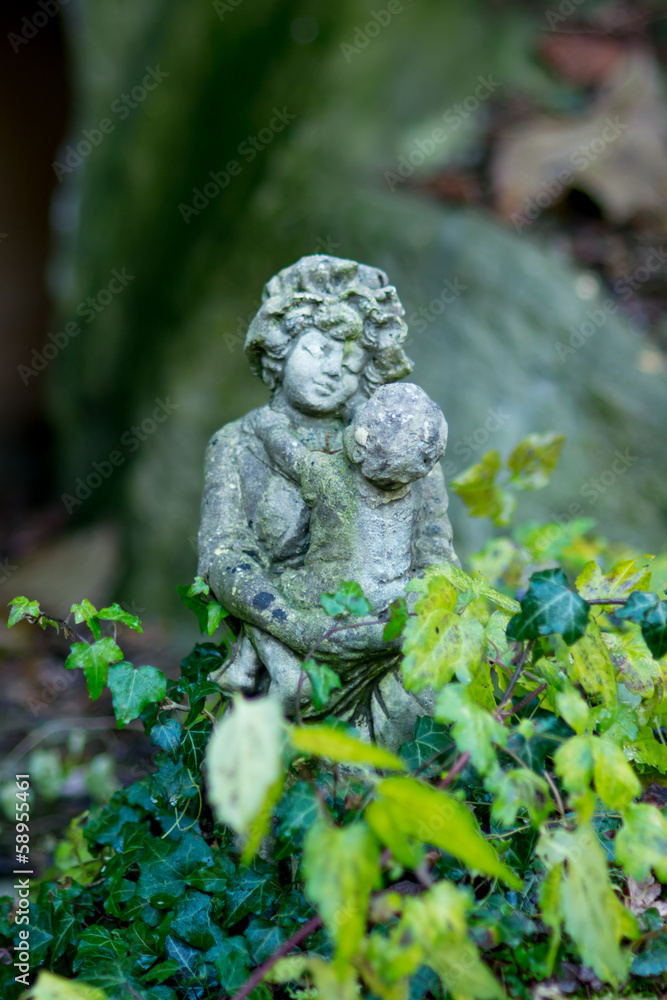stone figurine female with child