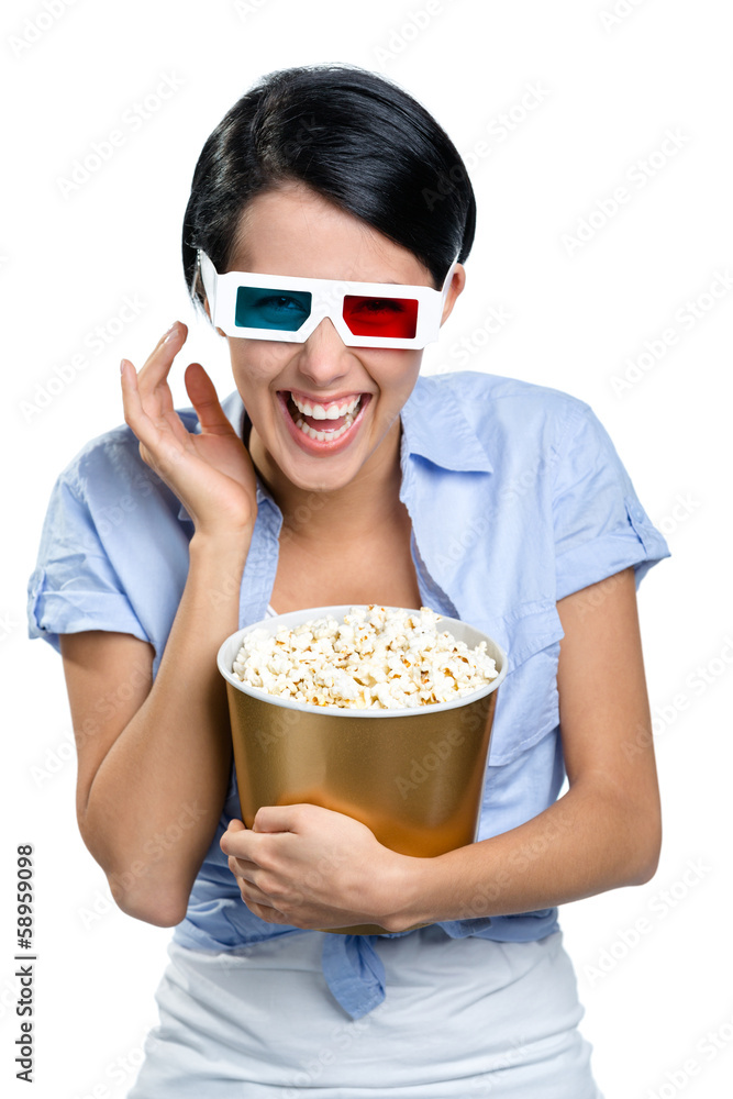 Girl watching 3D movie in spectacles with bowl full of popcorn Girl watching 3D movie in spectacles with bowl full of popcorn