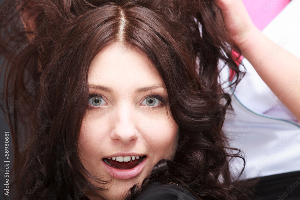 Surprised brunette woman open mouth wide eyed in hair salon Surprised brunette woman open mouth wide eyed in hair salon
