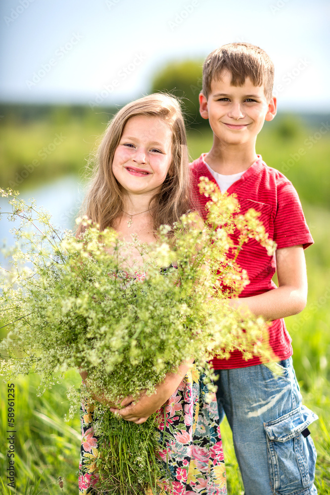 Spring. Boy gives girl a bouquet of flowers . Spring. Boy gives girl a bouquet of flowers .