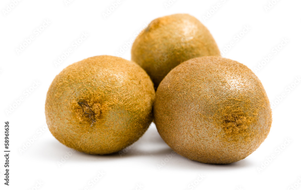 Close up of three kiwis, isolated on white Close up of three kiwis, isolated on white