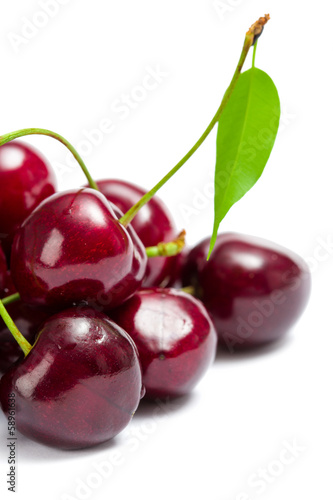 Close up of heap of cherry, isolated