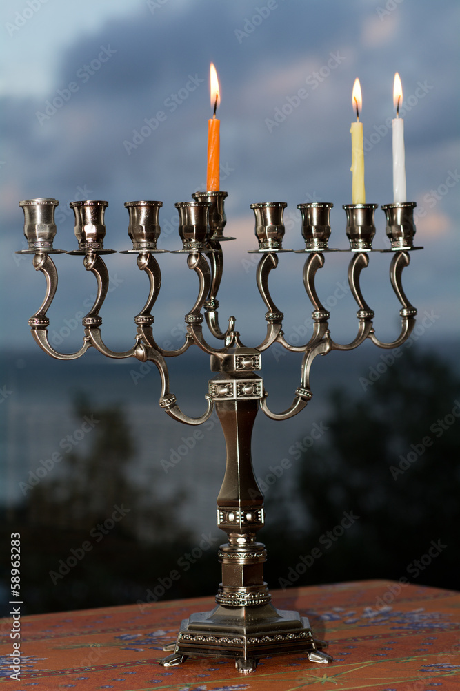 Fototapeta premium Hanukkah menorah on the second day of Hanukkah