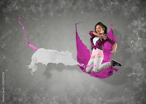 female dancer with splashes of paint