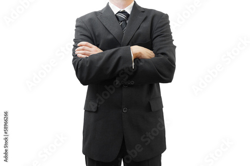 Businessman with his arms crossed against a white background