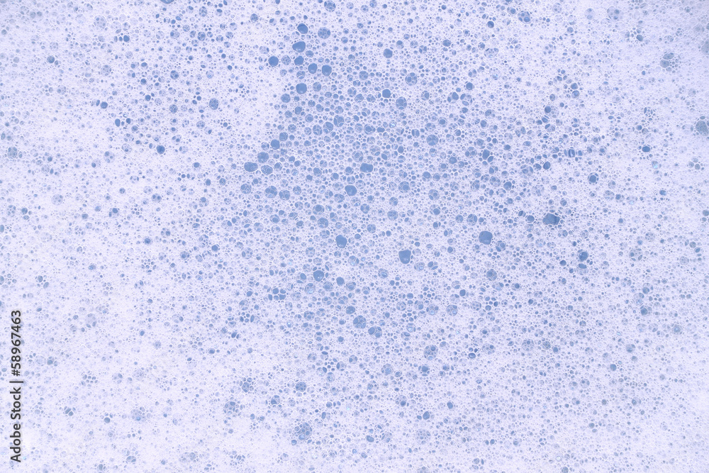 Bubble foam soap in blue water. Bubble foam soap in blue water.