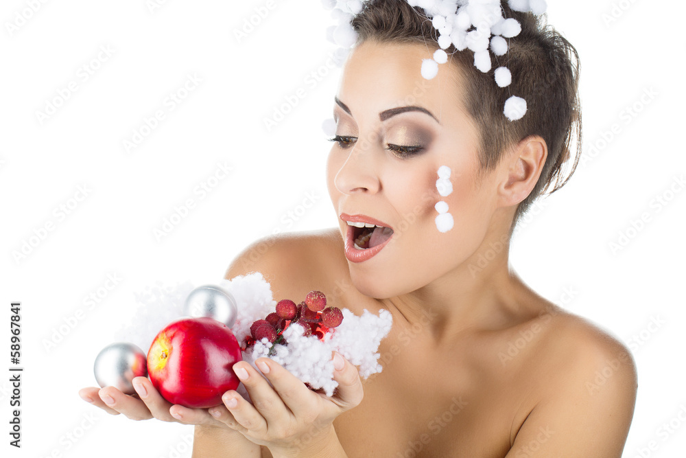 Girl holding christmas accessories Girl holding christmas accessories