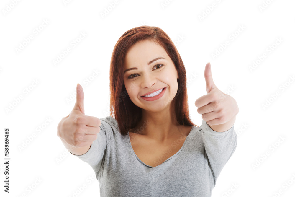 Portrait of casual beautiful woman showing OK. Portrait of casual beautiful woman showing OK.