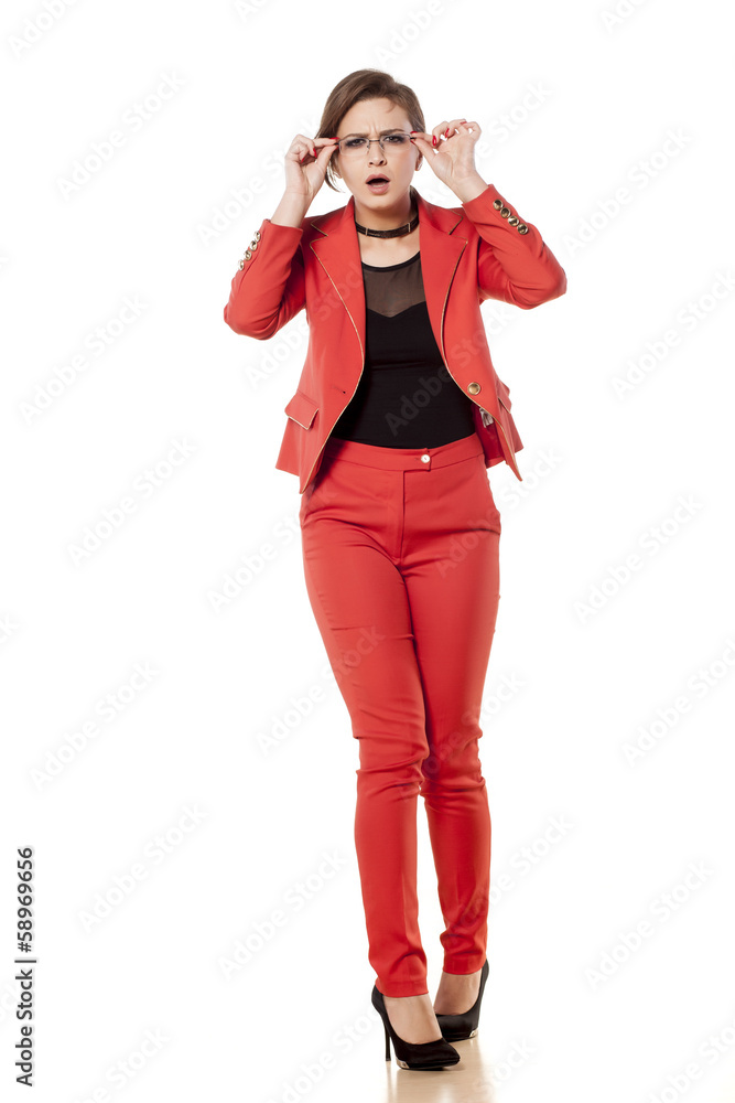 startled young business woman adjust her glasses startled young business woman adjust her glasses