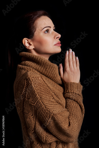 Young woman praying.