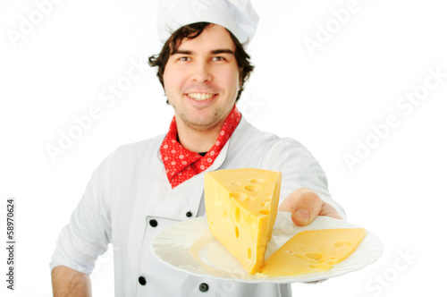 Cook holding cheese stack.