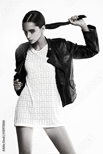 Fashion model pose on gray background