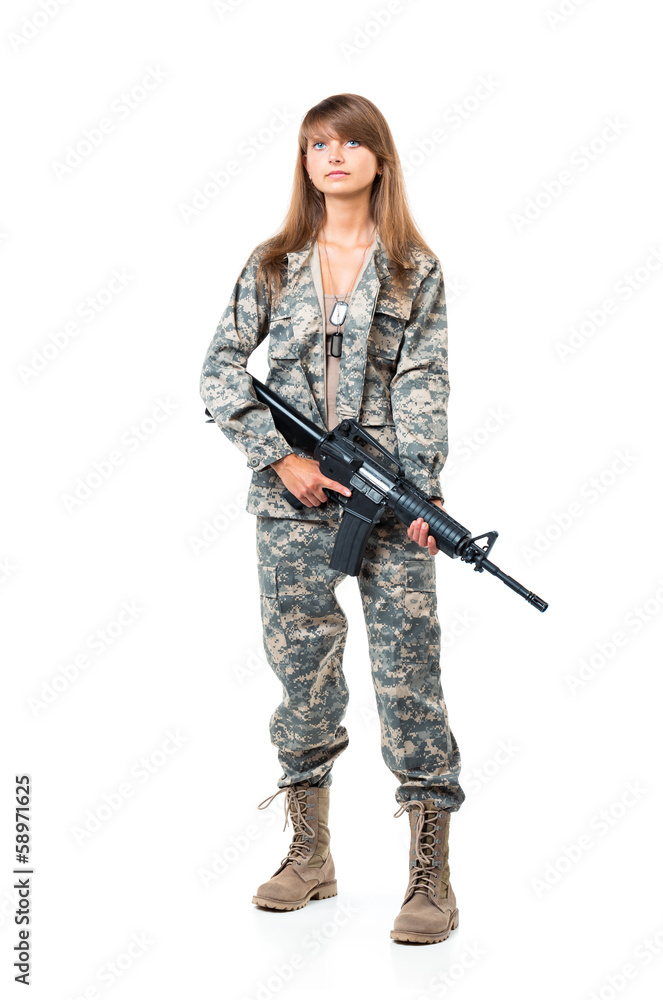 Soldier young beautyful girl dressed in a camouflage with a gun Soldier young beautyful girl dressed in a camouflage with a gun