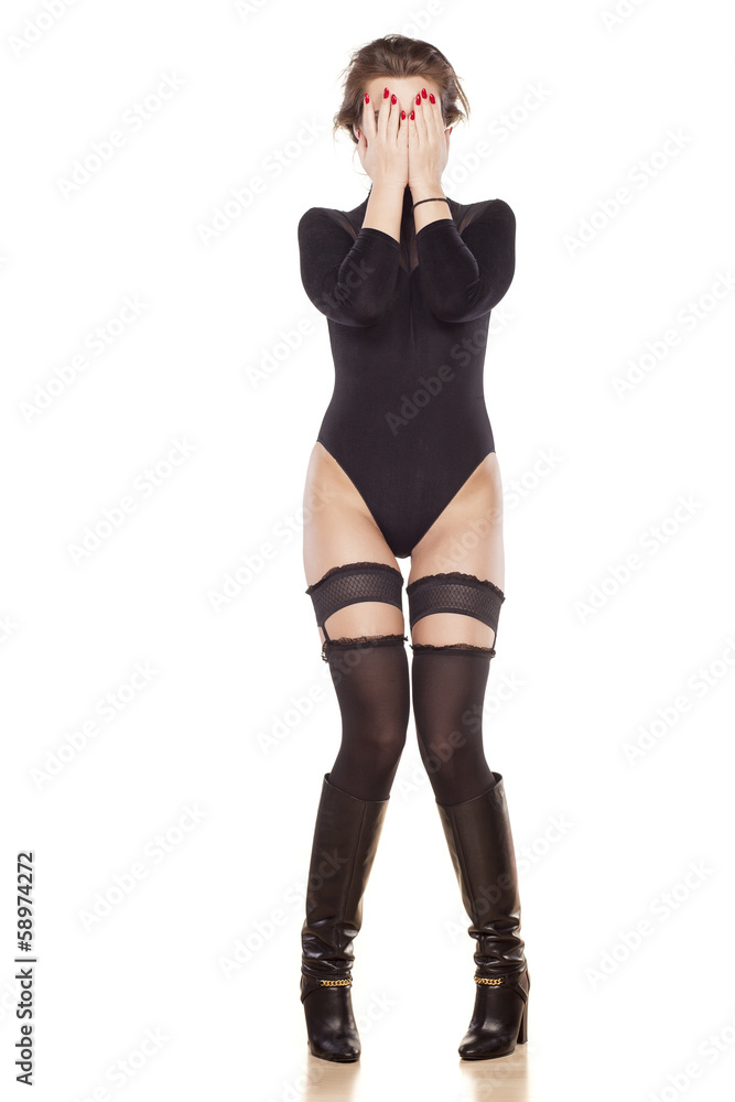 ashamed sexy young woman posing on white background ashamed sexy young woman posing on white background