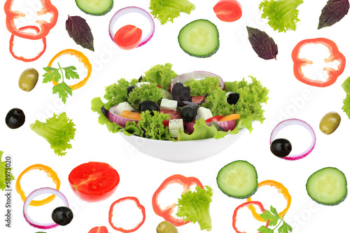 Fototapeta Naklejka Na Ścianę i Meble -  Fresh mixed vegetables around bowl of salad close up