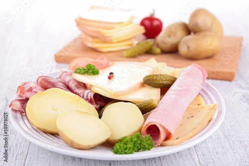 plate with cheese, ham, potato
