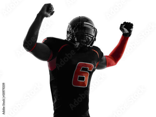 american football player arms raised  portrait silhouette