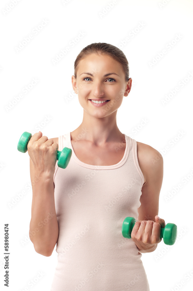 The girl with dumbbells in hands The girl with dumbbells in hands