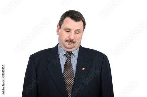 Man with double chin looks at the communist pin