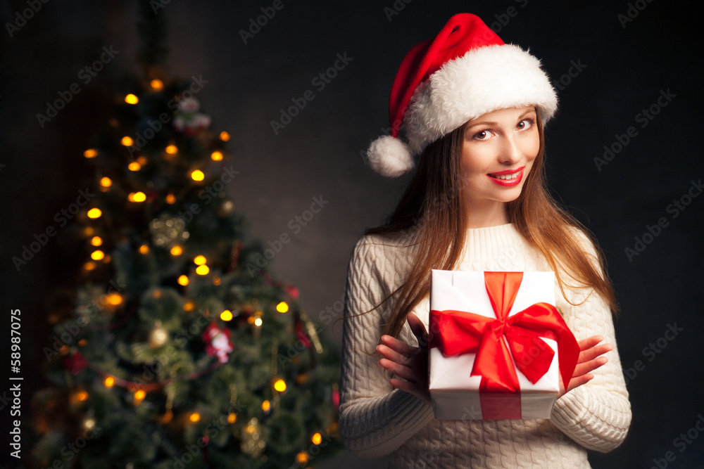 christmas. smiling woman with gift box
