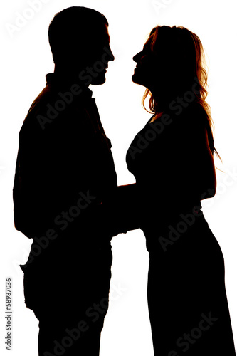silhouette of couple up close together
