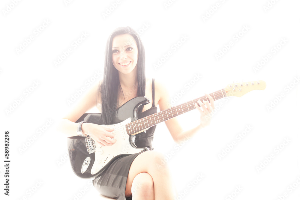 Fototapeta premium Frau mit E-Gitarre