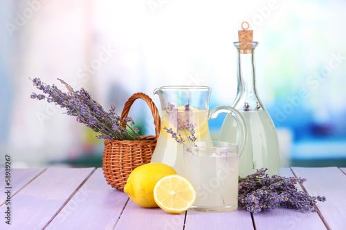 Fototapeta Naklejka Na Ścianę i Meble -  Lavender lemonade in glass bottle and jug,