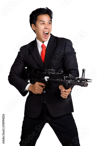 business man hold Machine gun shoot isolated
