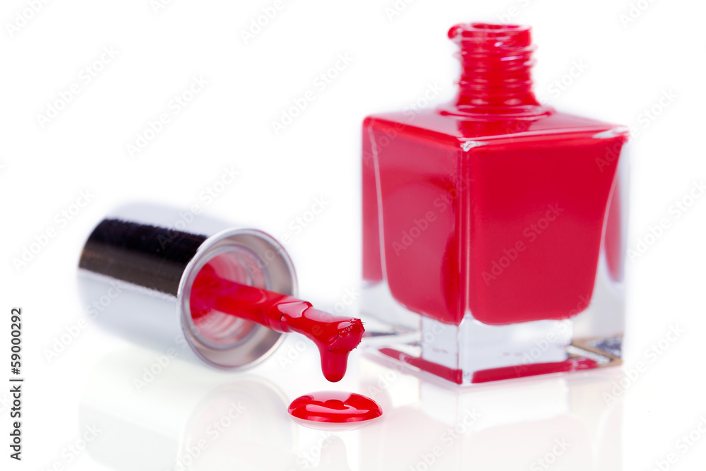 Φωτογραφία kleine glasflasche mit rotem nagellack offen mit tropfendem pins