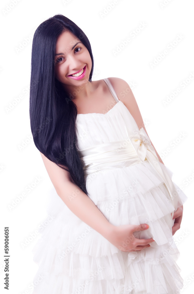Pregnant woman in wedding dress on white Pregnant woman in wedding dress on white