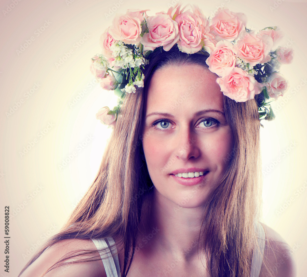 Beautiful smiling woman with flower