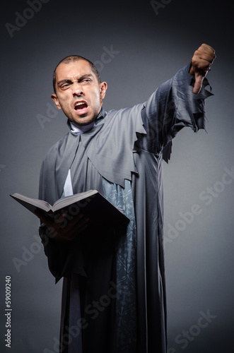 Wallpaper Mural Young priest isolated on the white Torontodigital.ca