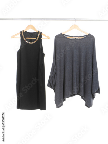 Two female dress isolated on hanging