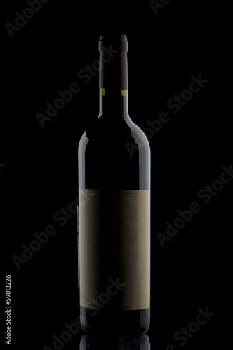 Wine bottle on black background
