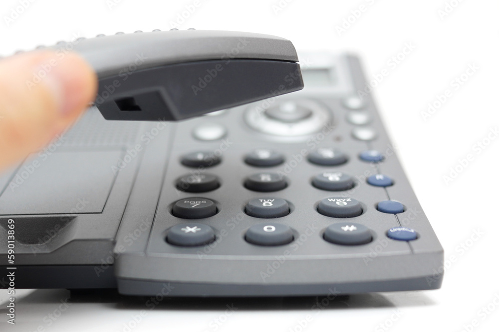 businessperson is answering the phone businessperson is answering the phone