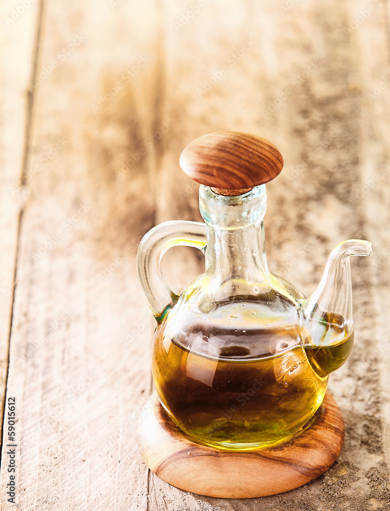 Glass decanter with olive oil